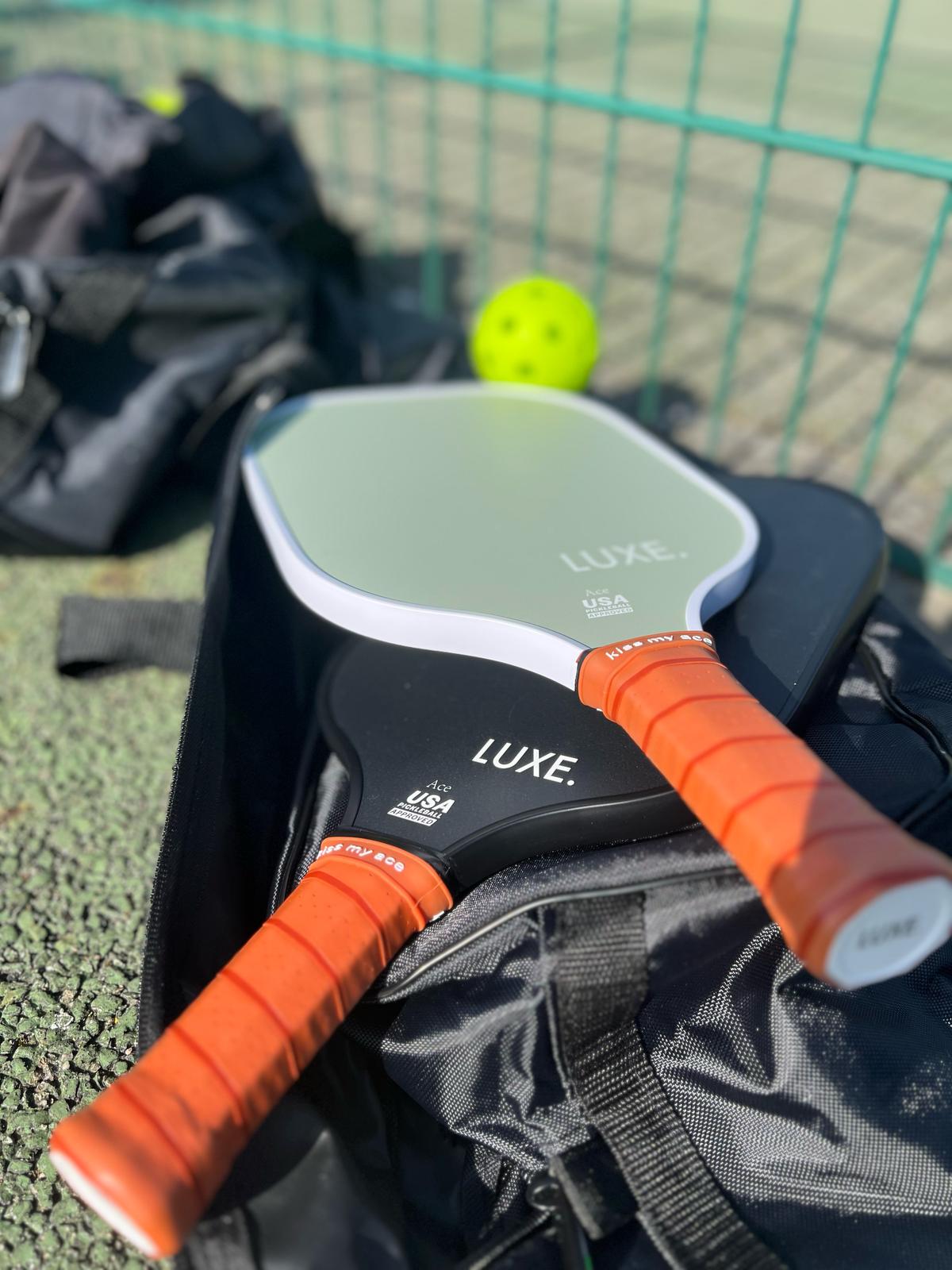 Pickleball paddles in equipment bag