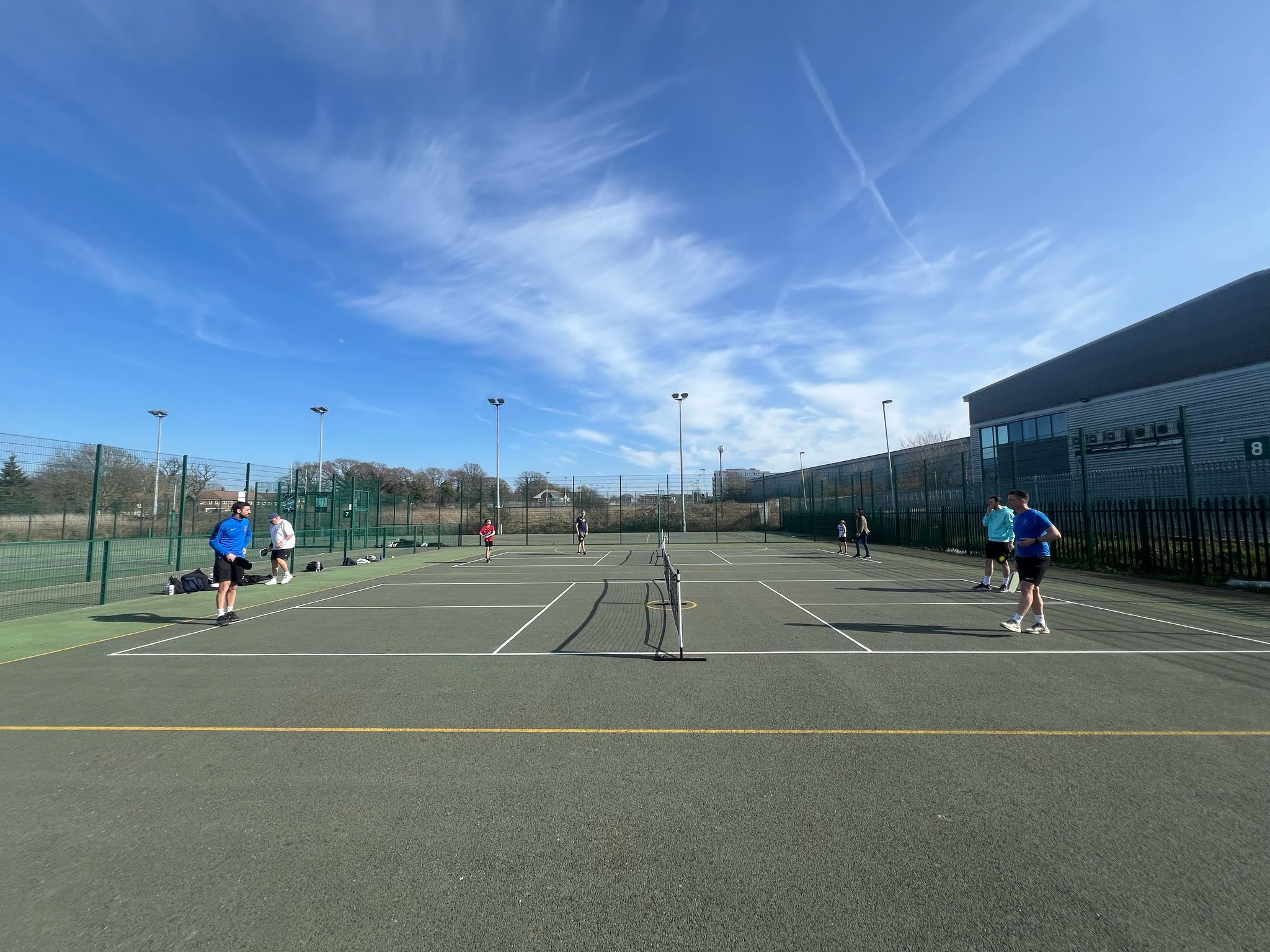 Pickleball courts with players