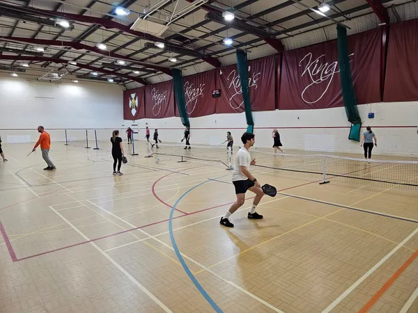 People playing pickleball
