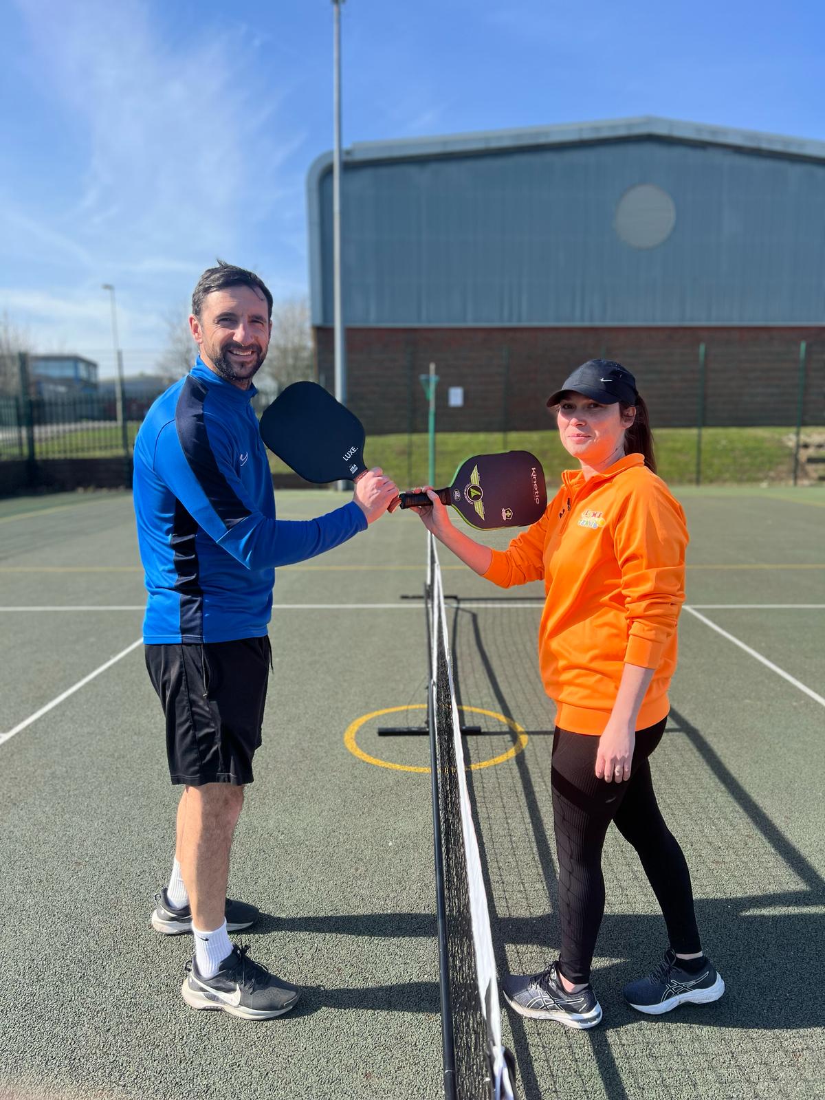 Players starting a pickleball game
