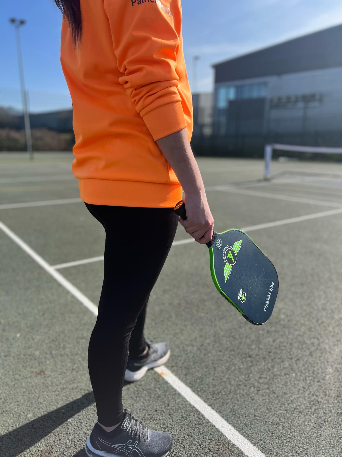 Player waiting on pickleball court